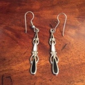 Silver tone black & white dangle fashion earrings.